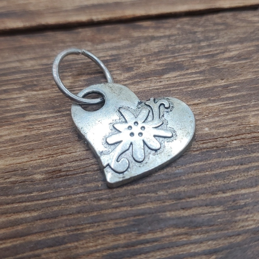 Sterling silver‎ ray of sunshine heart pendant